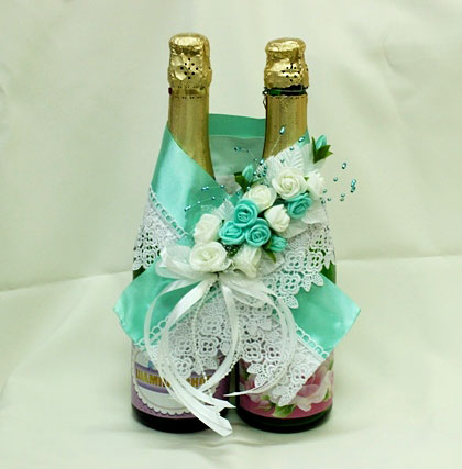 Свадебное украшение бутылок шампанского