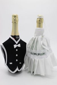 Украшение на шампанское жених и невеста белое с черным