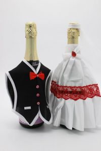 Украшение на шампанское жених и невеста белое с красным